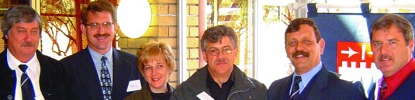 VUT Seminar in Secunda in front of the SAIMC stand at the Penmac show. From left to right: Piet Cilliers, Prof Henk de Jager, Dr Annelie Jordaan, At Roux, Piet Janse van Rensburg (SAIMC), Charles Smit